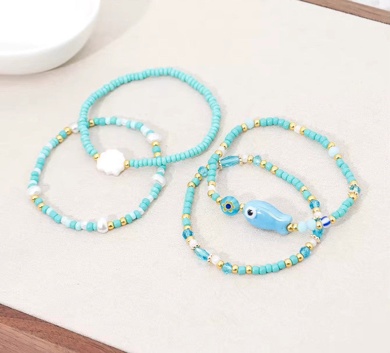 Lot de 4 bracelets perles bleu & doré – style bohème été, neufs