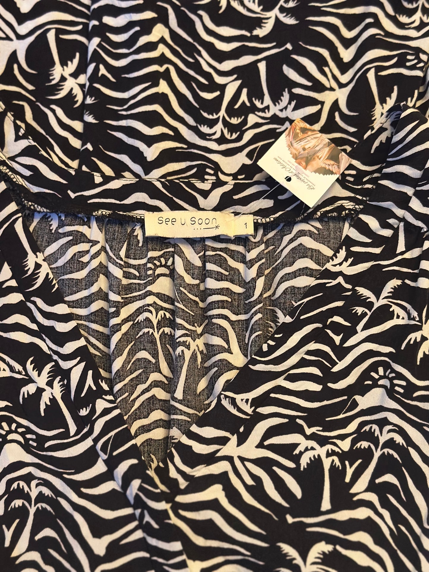 Robe imprimé zèbre palmiers noir et blanc T.36