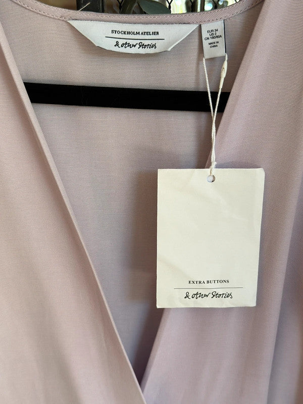 Robe portefeuille lilas pastel – Taille 34 – Neuve avec étiquette