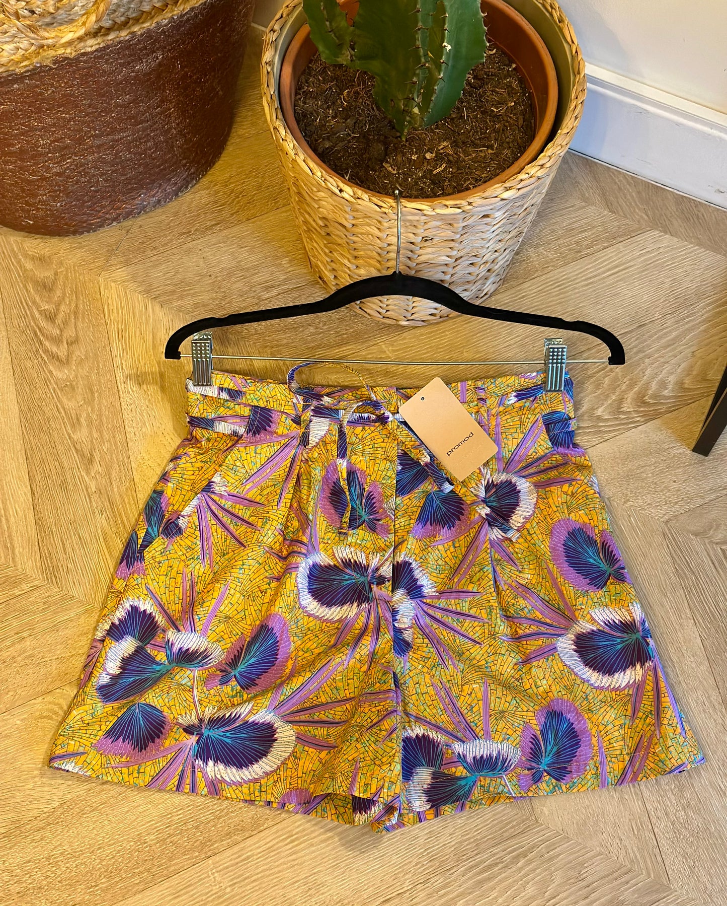 Short imprimé orangé lilas T.36 Neuf
