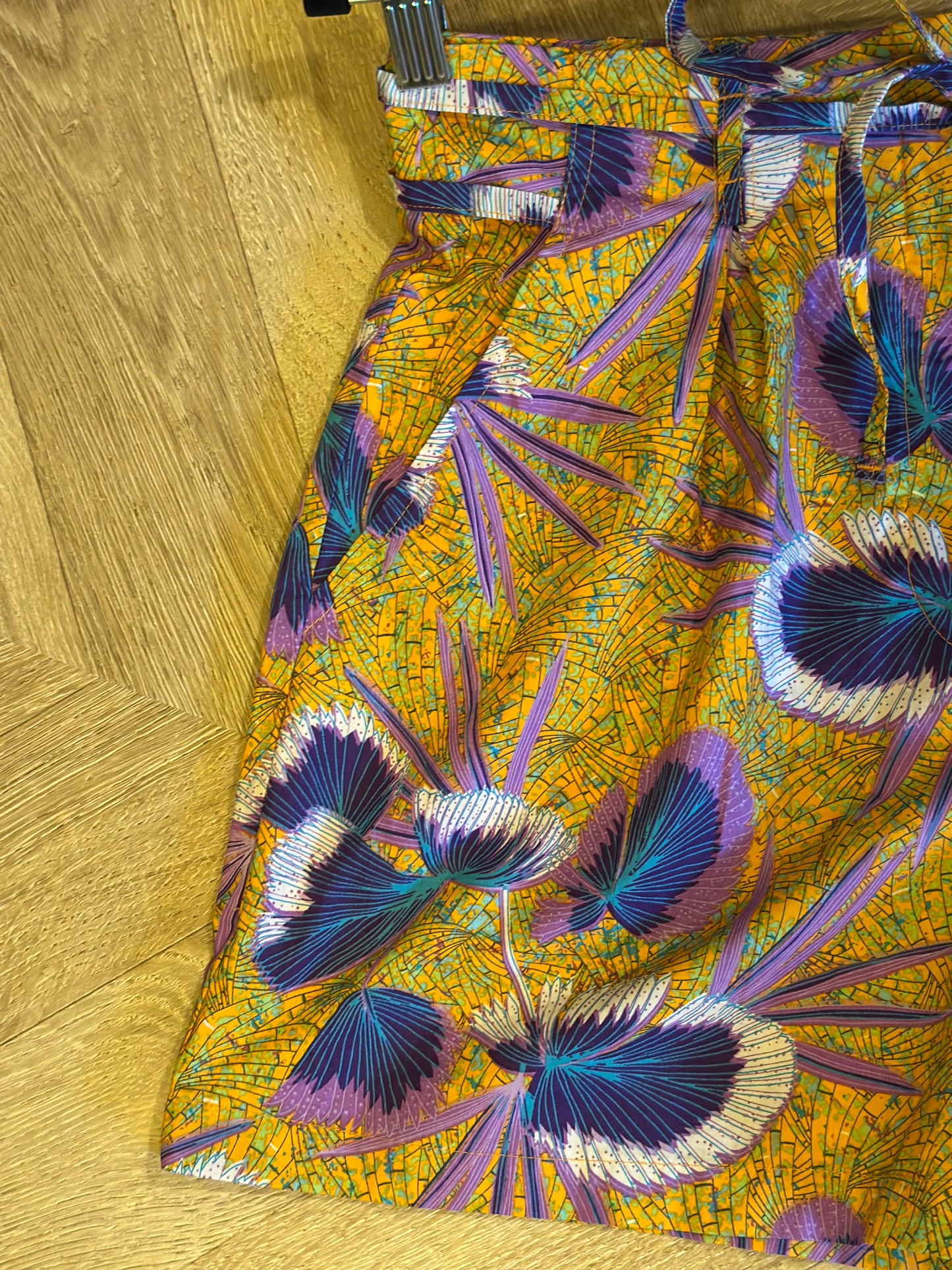 Short imprimé orangé lilas T.36 Neuf