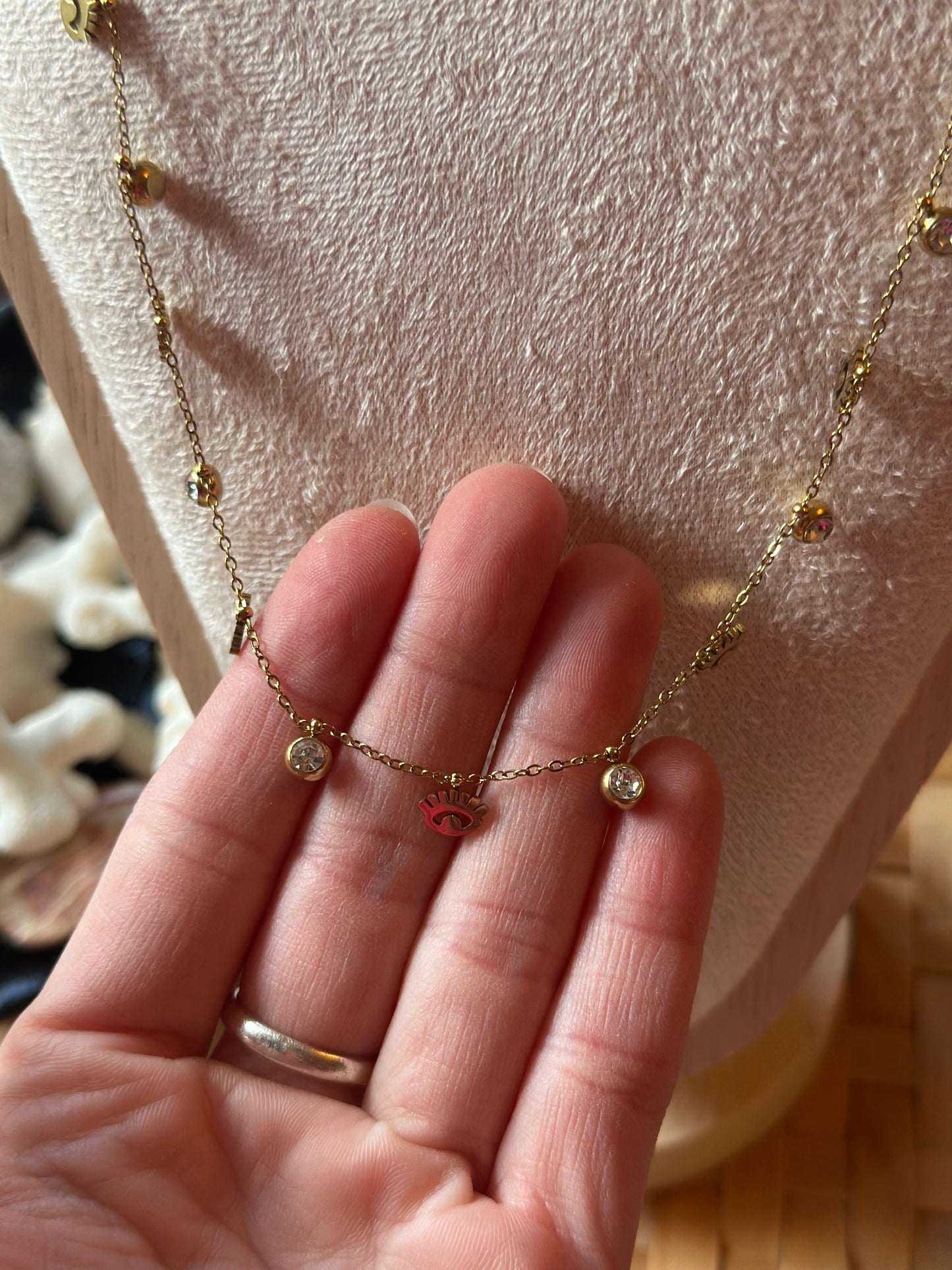 Collier doré en acier inoxydable – pampilles œil & strass (neuf)