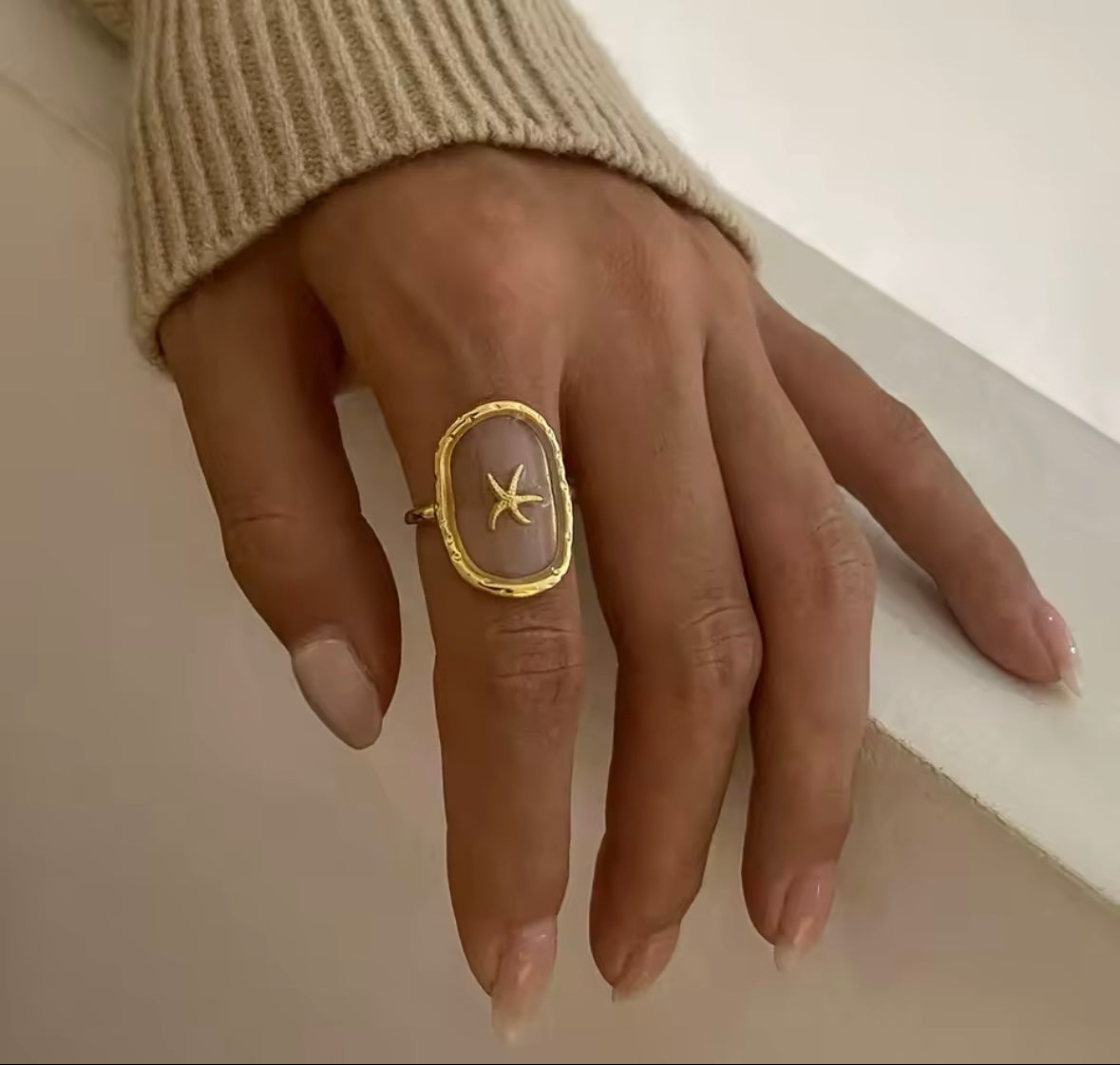 Bague réglable transparente étoile de mer doré en acier inoxydable