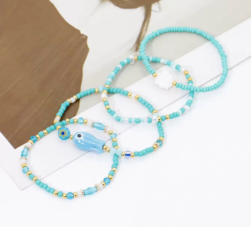 Lot de 4 bracelets perles bleu & doré – style bohème été, neufs