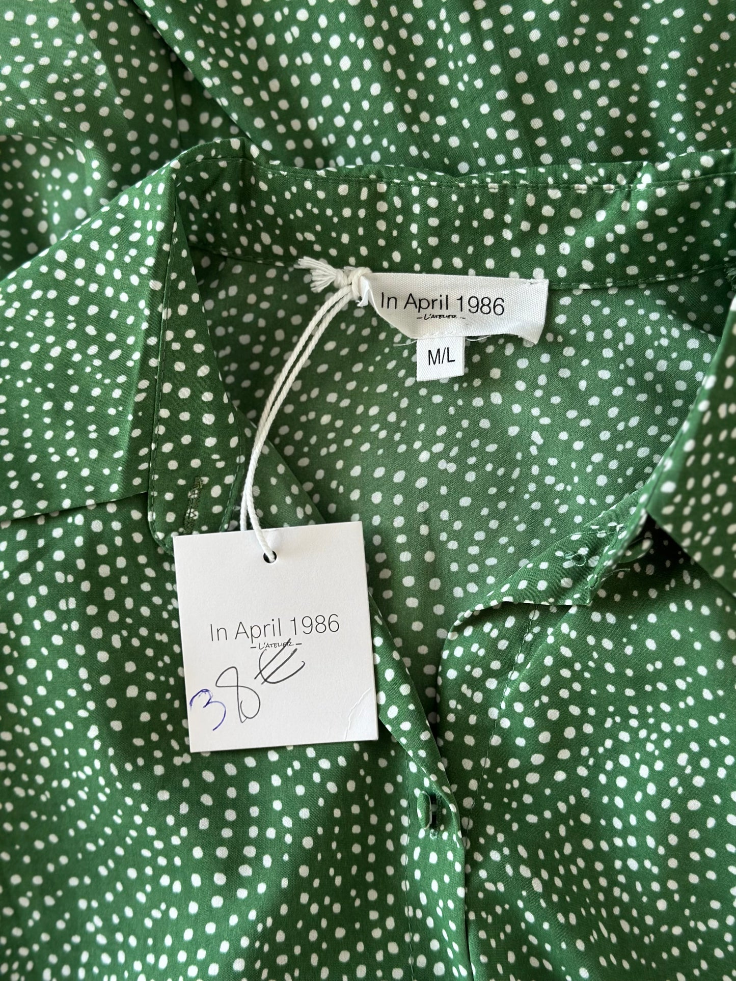 Robe fluide à volants verte à pois blancs T.38/40
