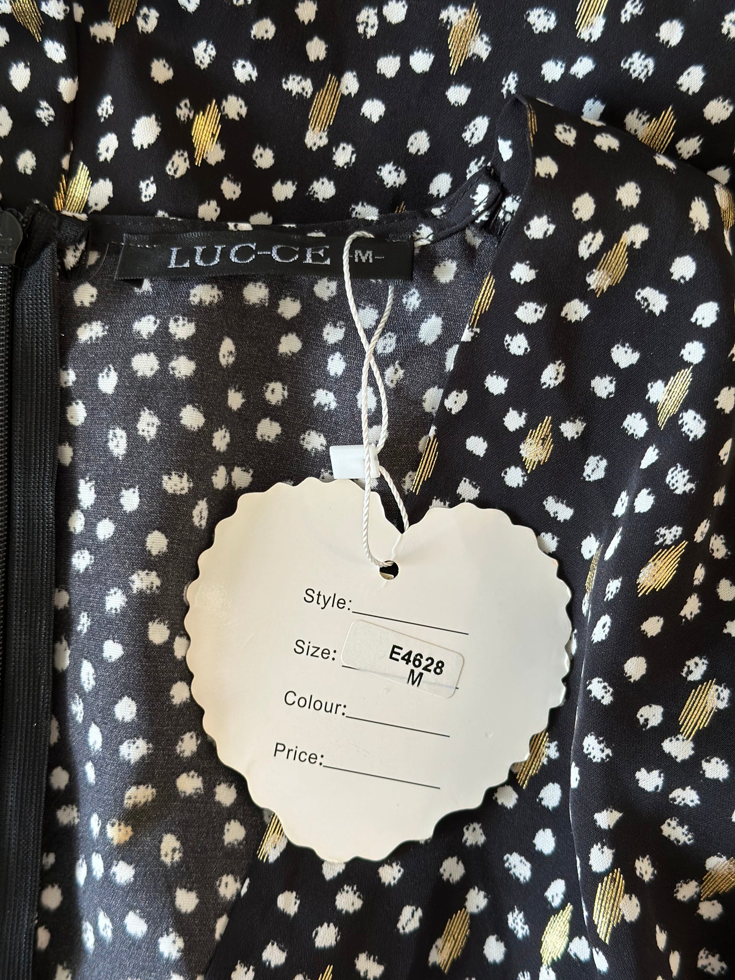 Combishort noir à pois dorés neuve T.34
