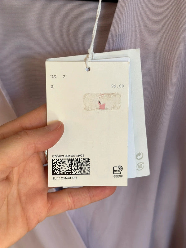 Robe portefeuille lilas pastel – Taille 34 – Neuve avec étiquette