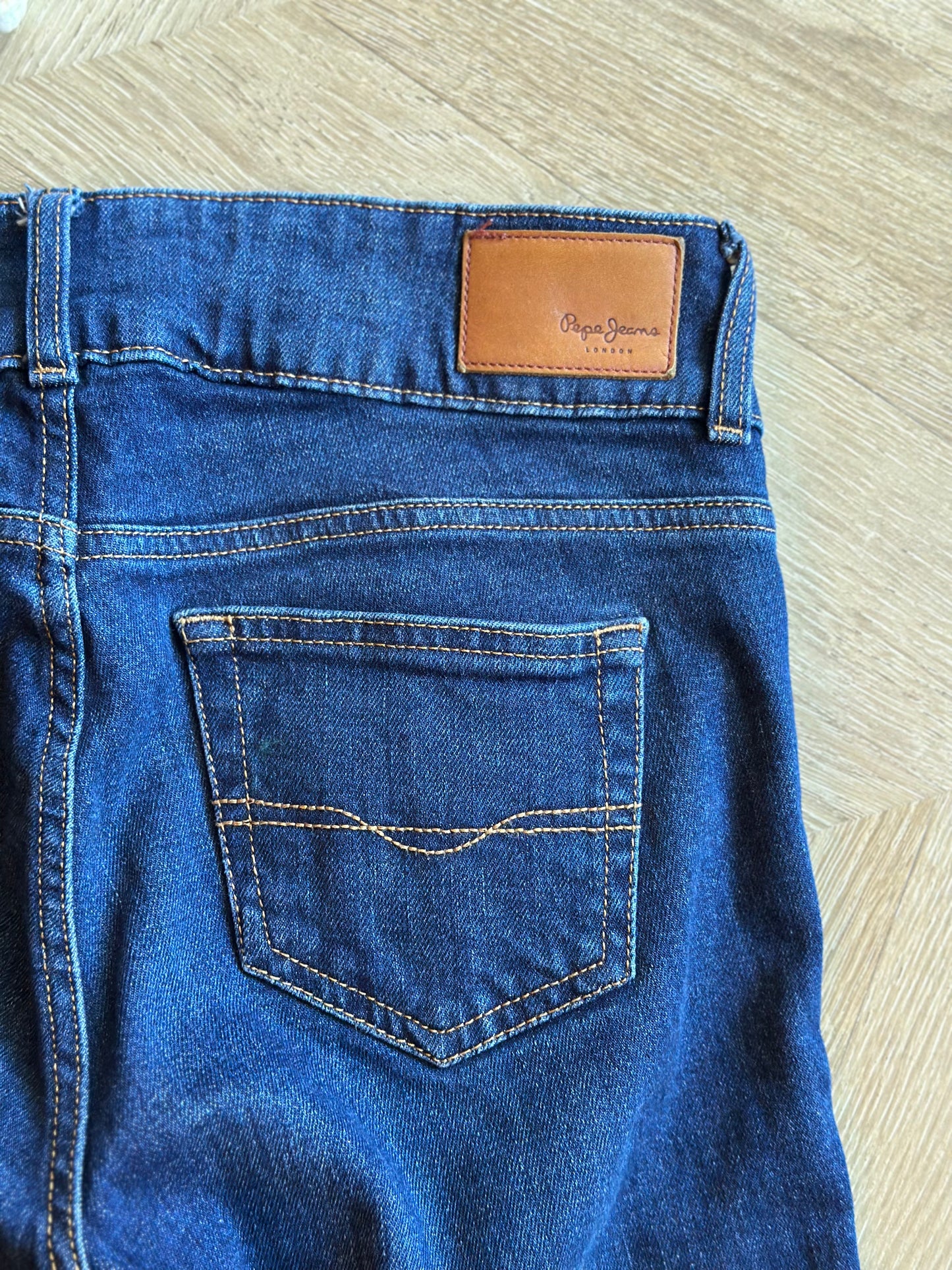 Jean flare bleu brut taille basse coton T.36