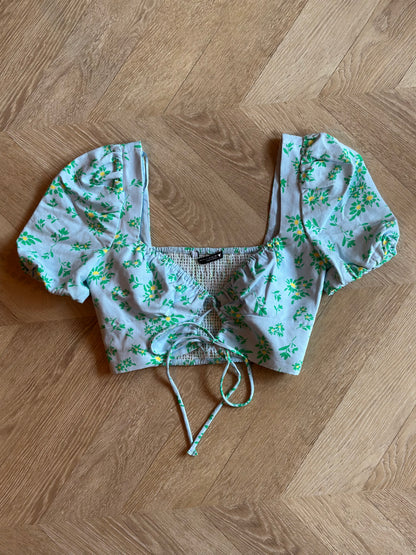 Top crop fleuri vert manches bouffantes T.34