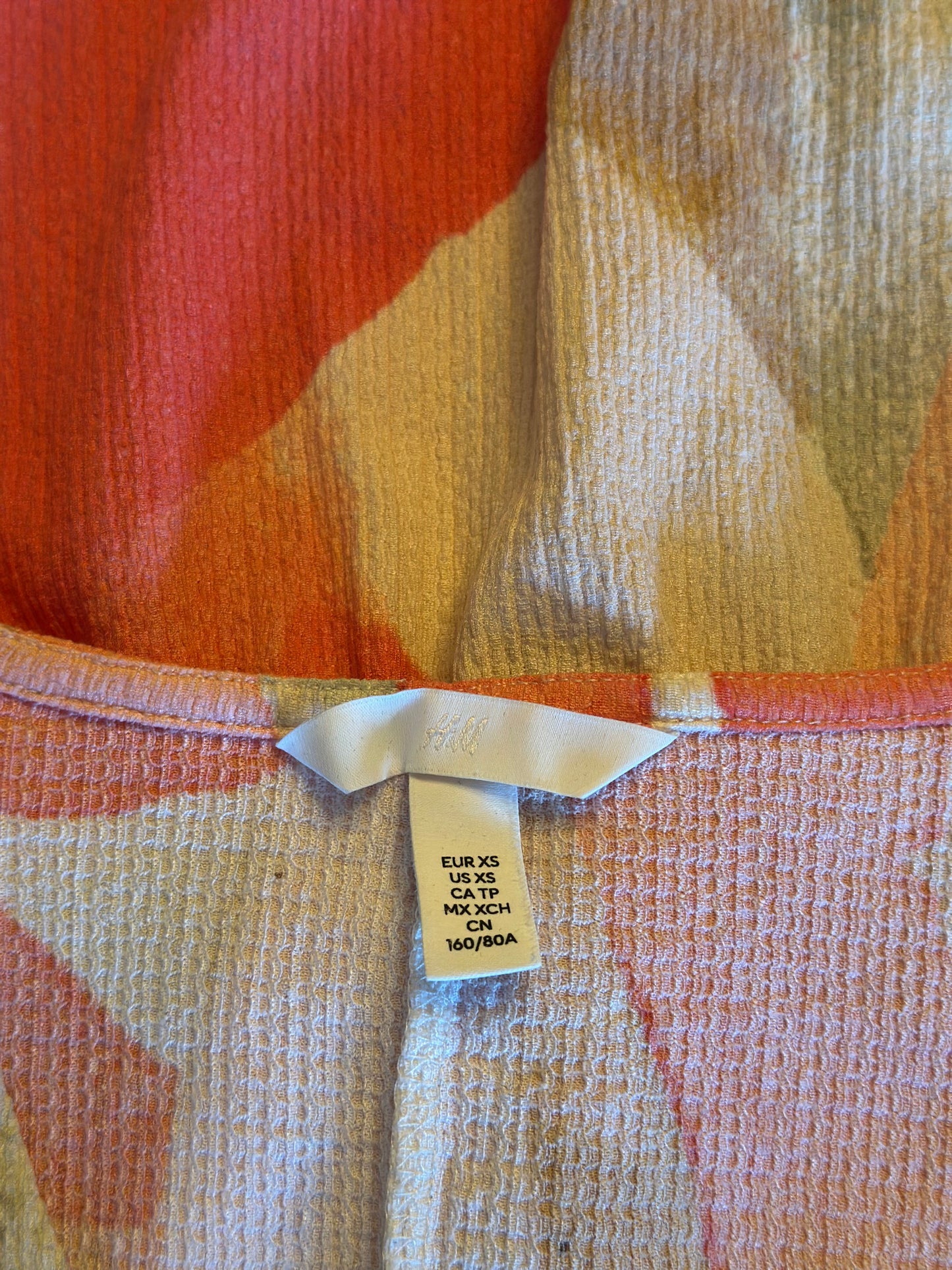 Robe d’été fluide imprimé corail et beige T.34/36