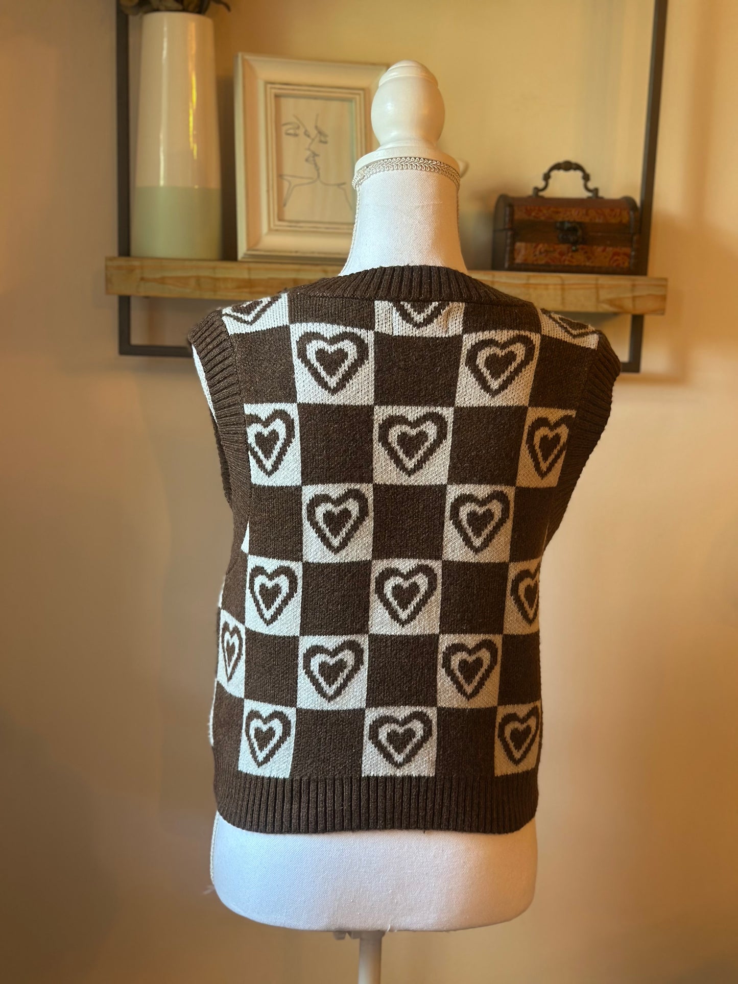 Pull sans manches à carreaux cœur T.36