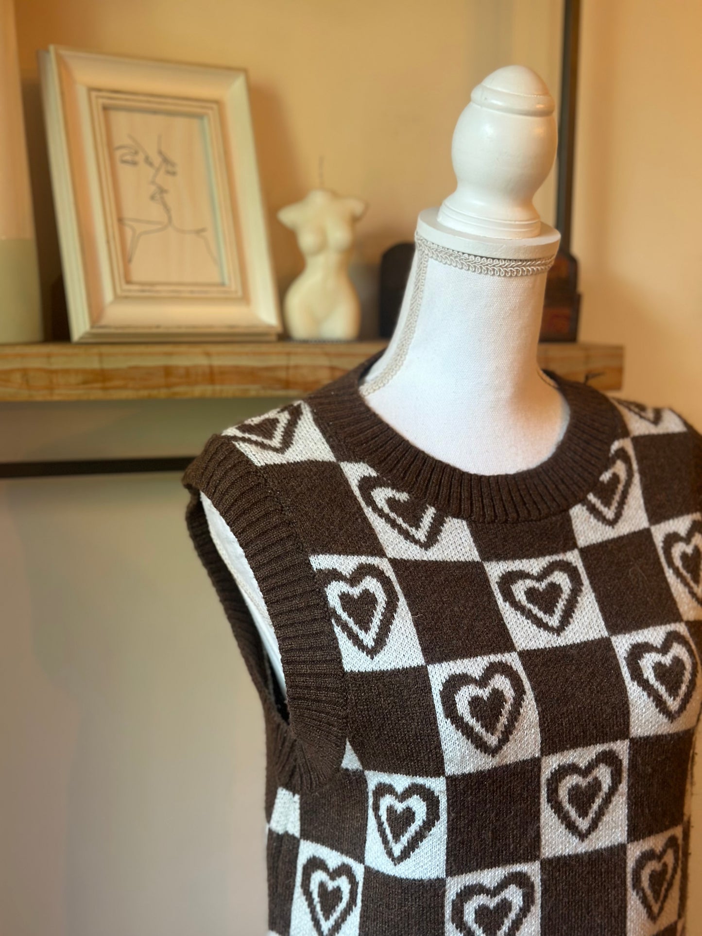 Pull sans manches à carreaux cœur T.36