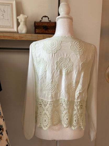 Gilet en dentelle à motifs floraux T.36/38