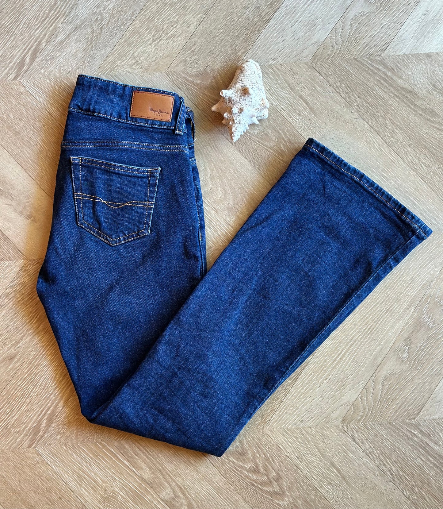 Jean flare bleu brut taille basse coton T.36