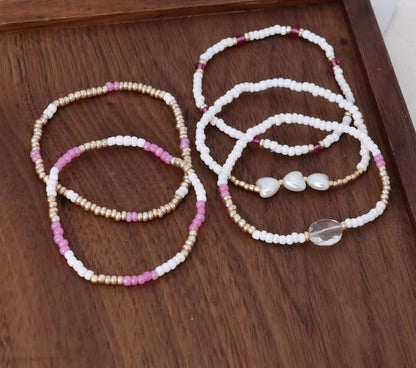 Lot de 5 bracelets perles – blanc, doré, rose – Neufs
