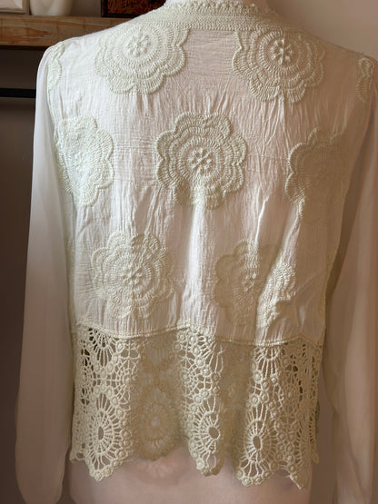 Gilet en dentelle à motifs floraux T.36/38