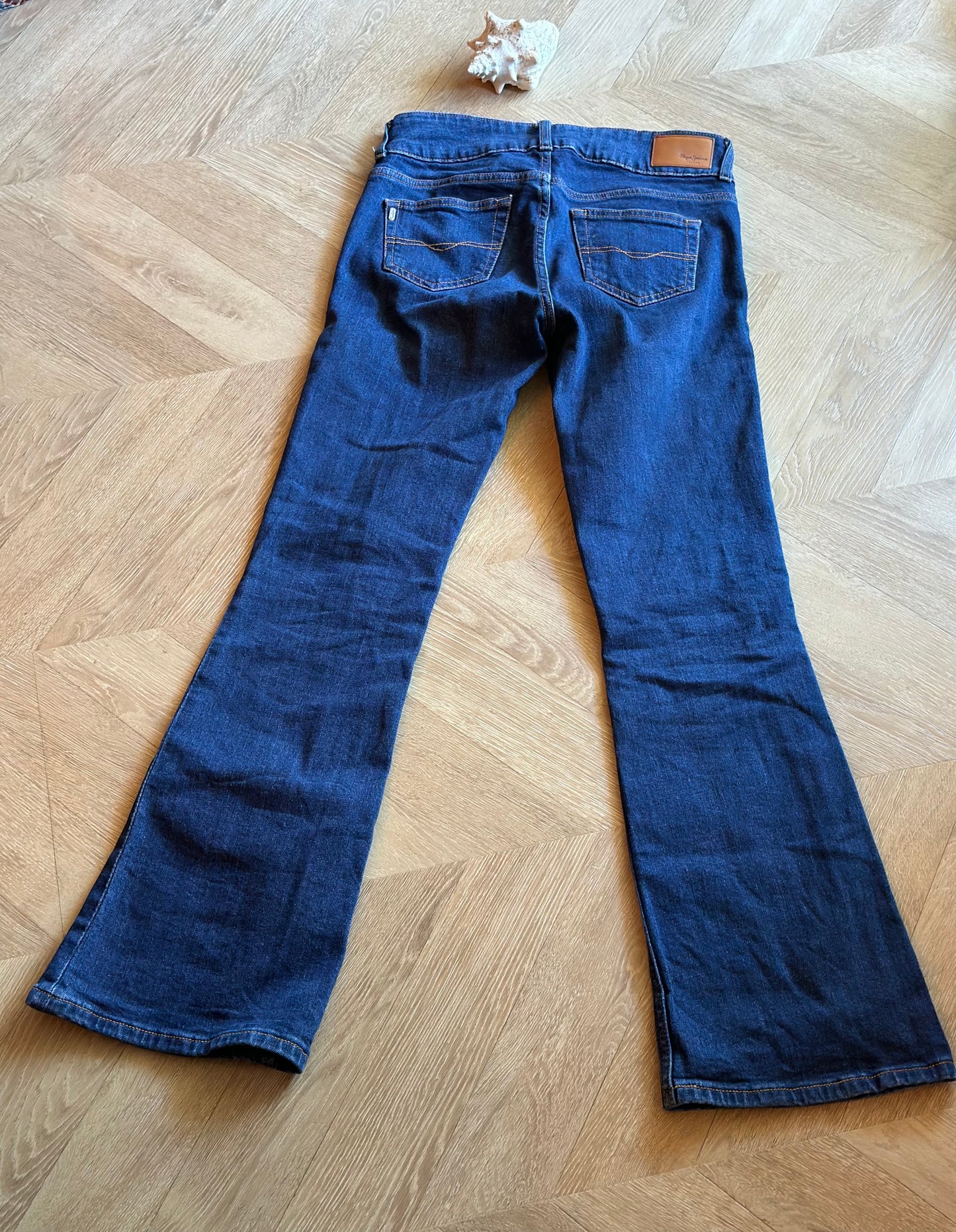 Jean flare bleu brut taille basse coton T.36