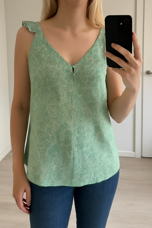 Top réversible vert imprimé T.40