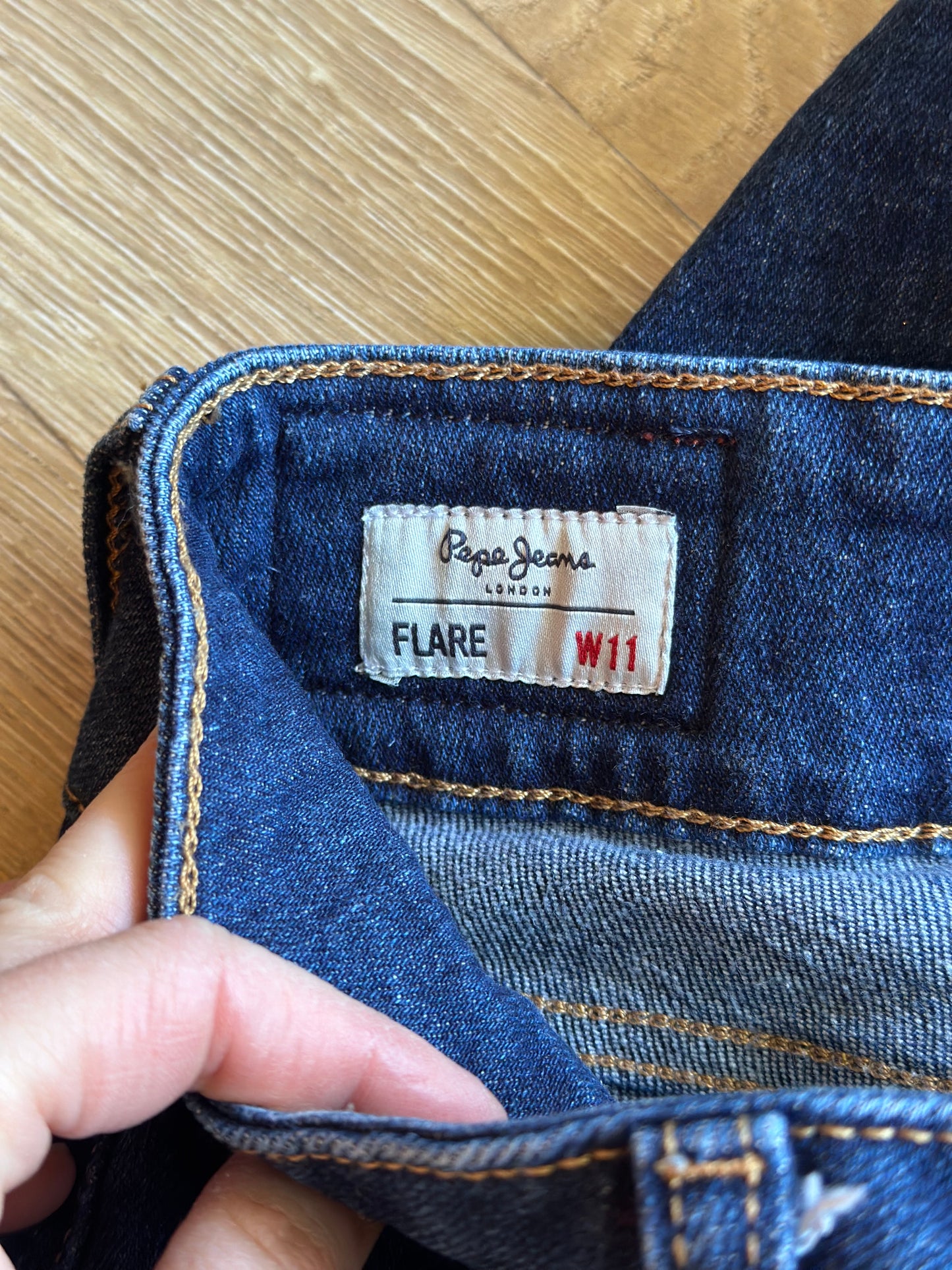 Jean flare bleu brut taille basse coton T.36