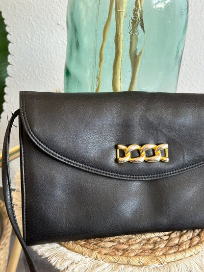 Sac pochette en bandoulière en cuir vintage