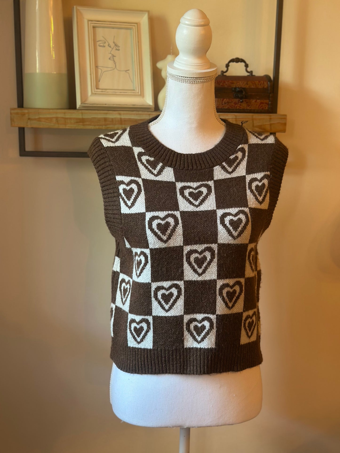 Pull sans manches à carreaux cœur T.36