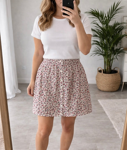 Jupe fluide à motifs blanc et rose neuve T.40/42