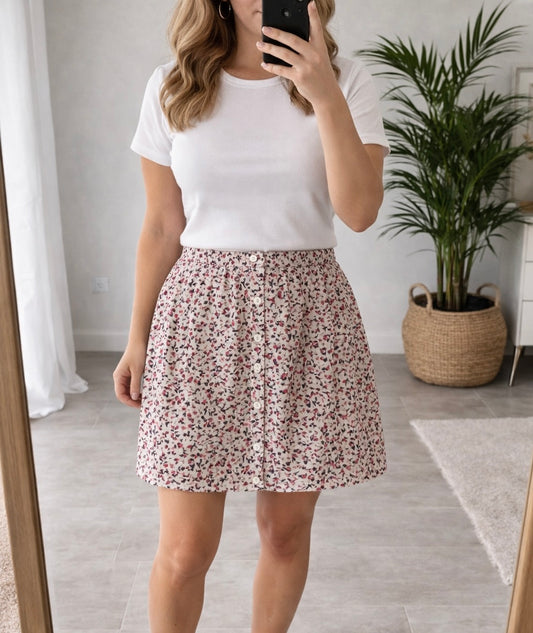 Jupe fluide à motifs blanc et rose neuve T.40/42