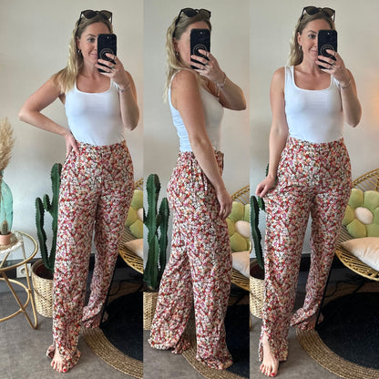 Pantalon fluide à jambes larges motifs fleuris colorés T.36