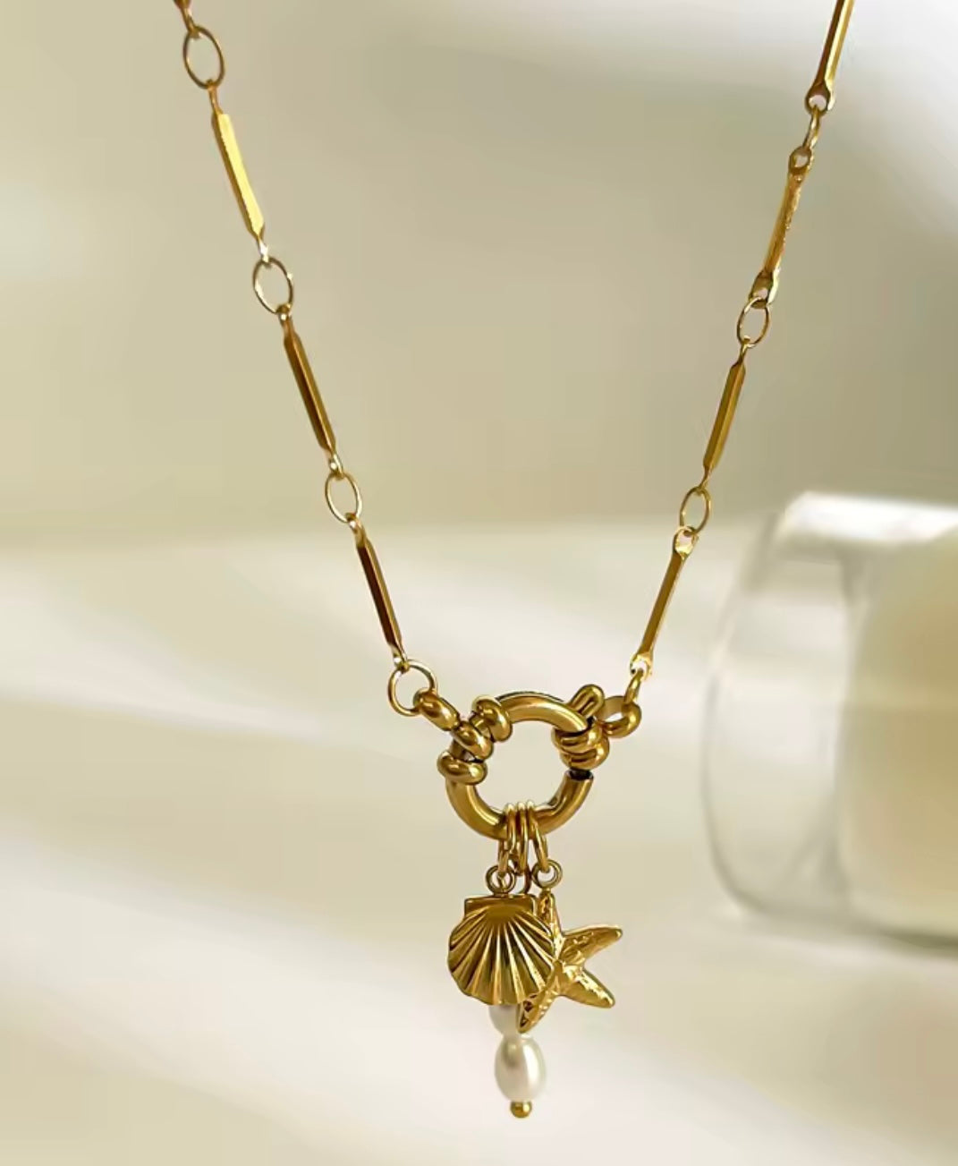 Collier “Trio Marin” – Acier inoxydable 316L, pendentifs coquillage, étoile de mer & perle