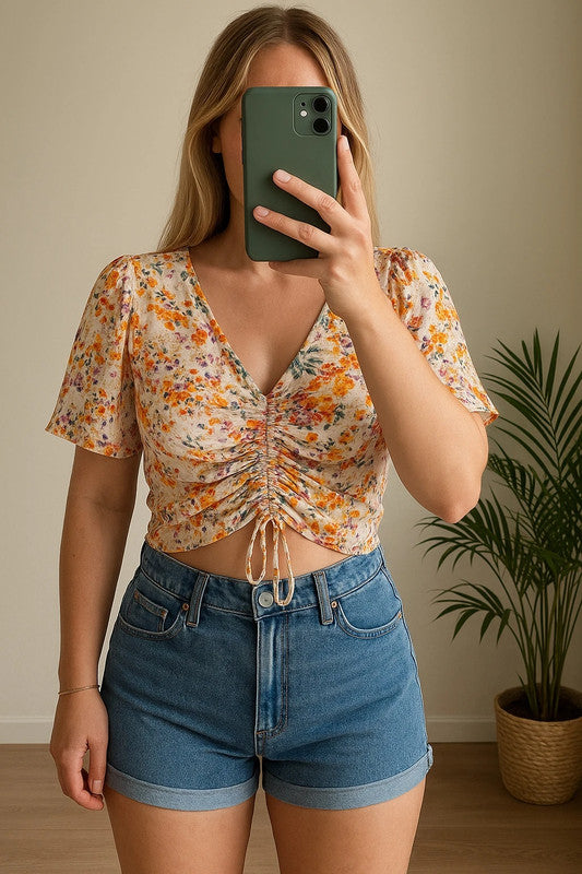 Blouse d'été à effet drapé et motifs fleuris T.38