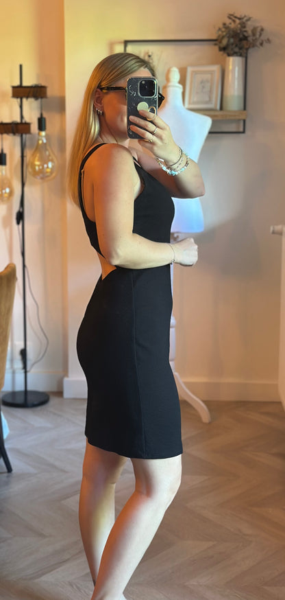 Robe courte noire dos ouvert texturée T.38