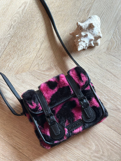 Sac bandoulière imprimé vache rose noir Dr Martens