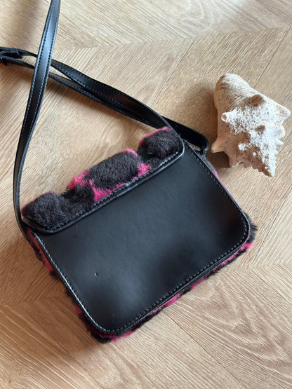 Sac bandoulière imprimé vache rose noir Dr Martens
