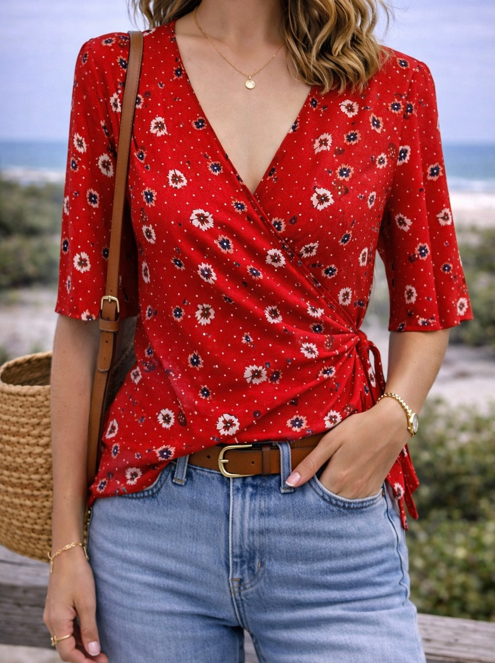 Blouse portefeuille rouge à motifs fleuris T.34