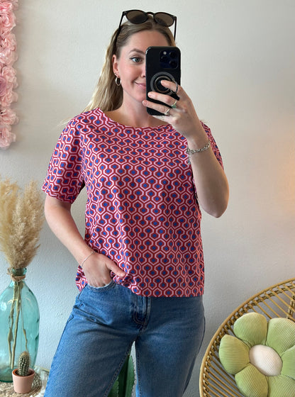 Blouse à motifs rouge, rose et bleu T.38