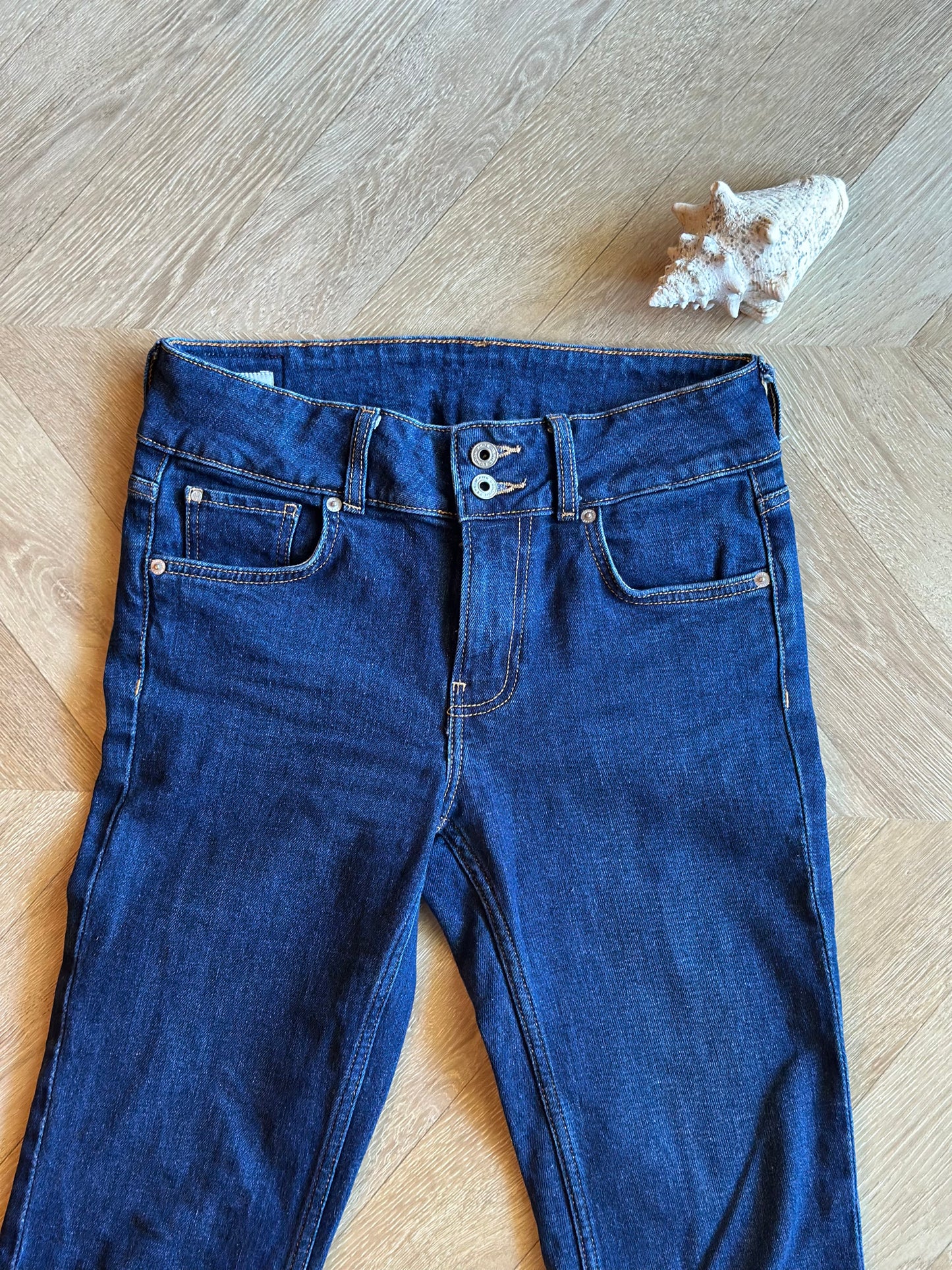 Jean flare bleu brut taille basse coton T.36