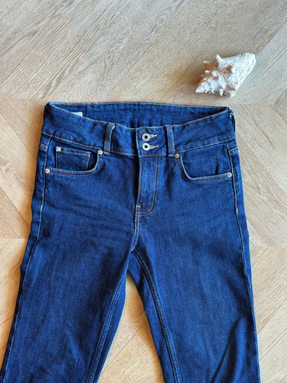 Jean flare bleu brut taille basse coton T.36