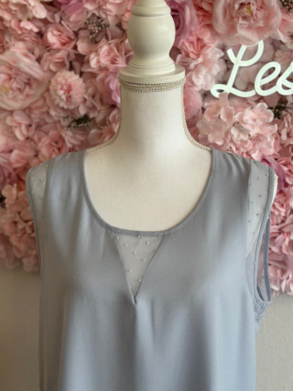 Blouse sans manches bleu clair, T.42