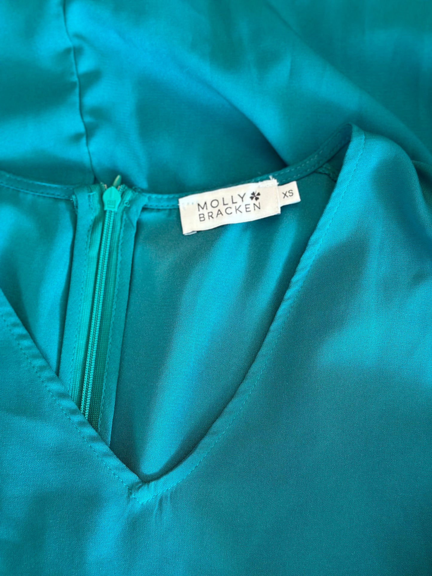 Robe d’été verte à volants T.34