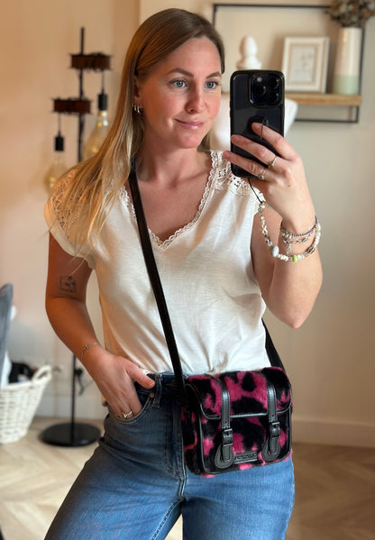 Sac bandoulière imprimé vache rose noir Dr Martens