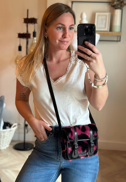 Sac bandoulière imprimé vache rose noir Dr Martens