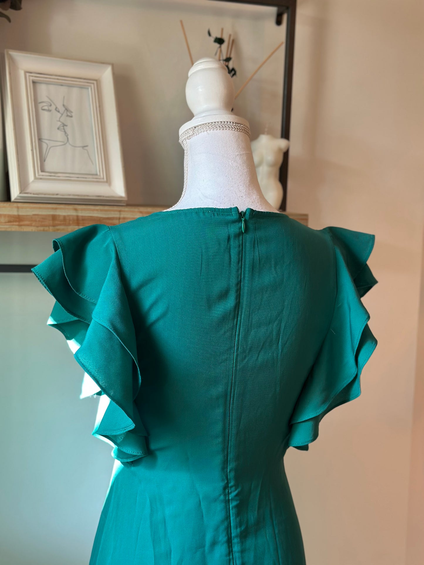 Robe d’été verte à volants T.34