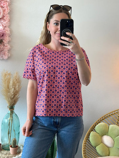 Blouse à motifs rouge, rose et bleu T.38