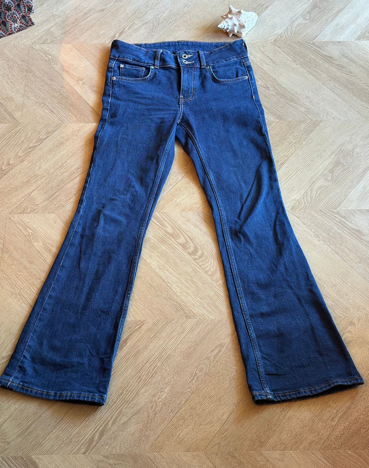 Jean flare bleu brut taille basse coton T.36