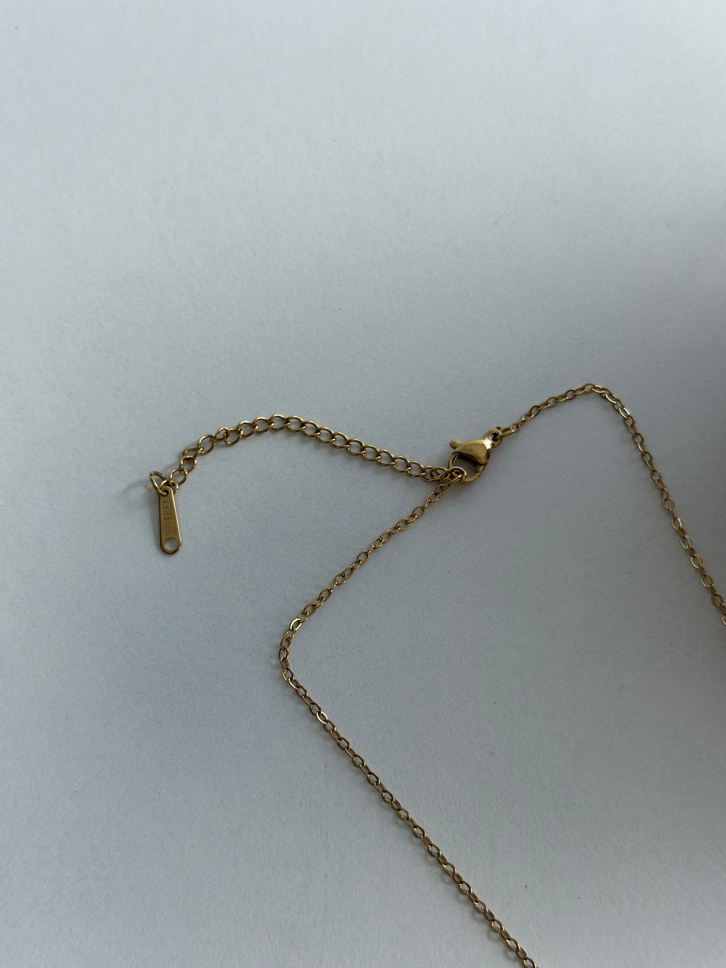 Collier doré en acier inoxydable avec pendentif étoile neuf