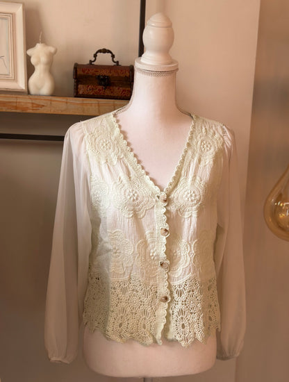 Gilet en dentelle à motifs floraux T.36/38