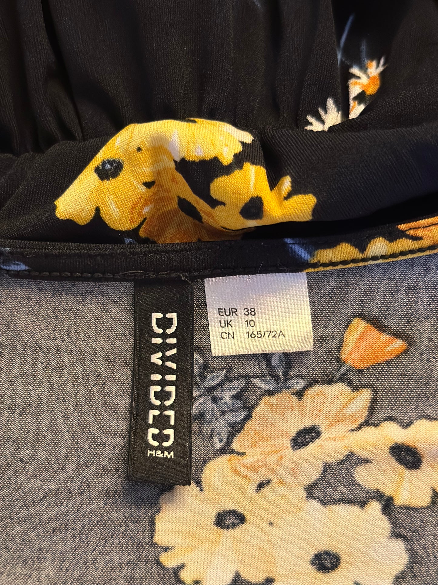 Combishort fleuri noir jaune T.38