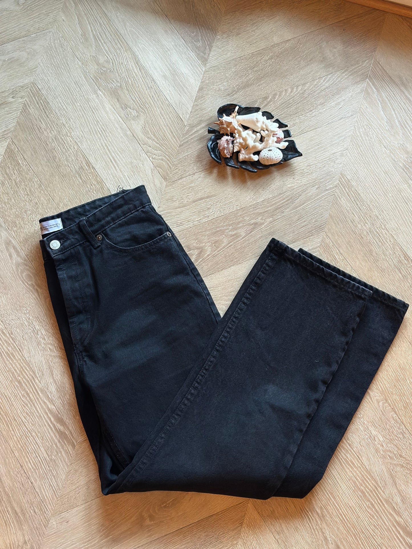 Jean noir jambes larges T.38