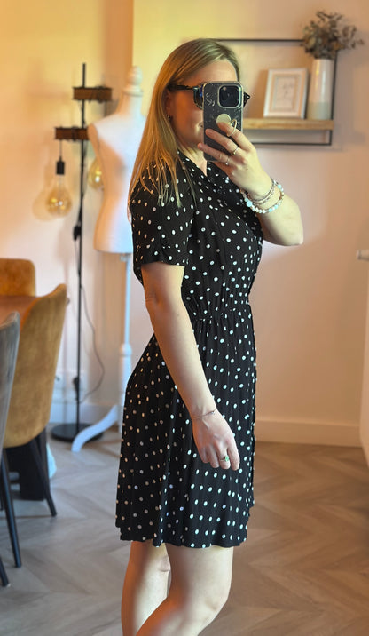 Robe courte noire à pois blancs style pin-up T.34