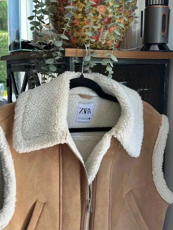Veste sans manches style peau retournée beige et écru T.34